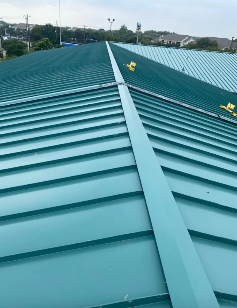 Green commercial metal roof ridge and valley for Metal Roof Repair in Suffield